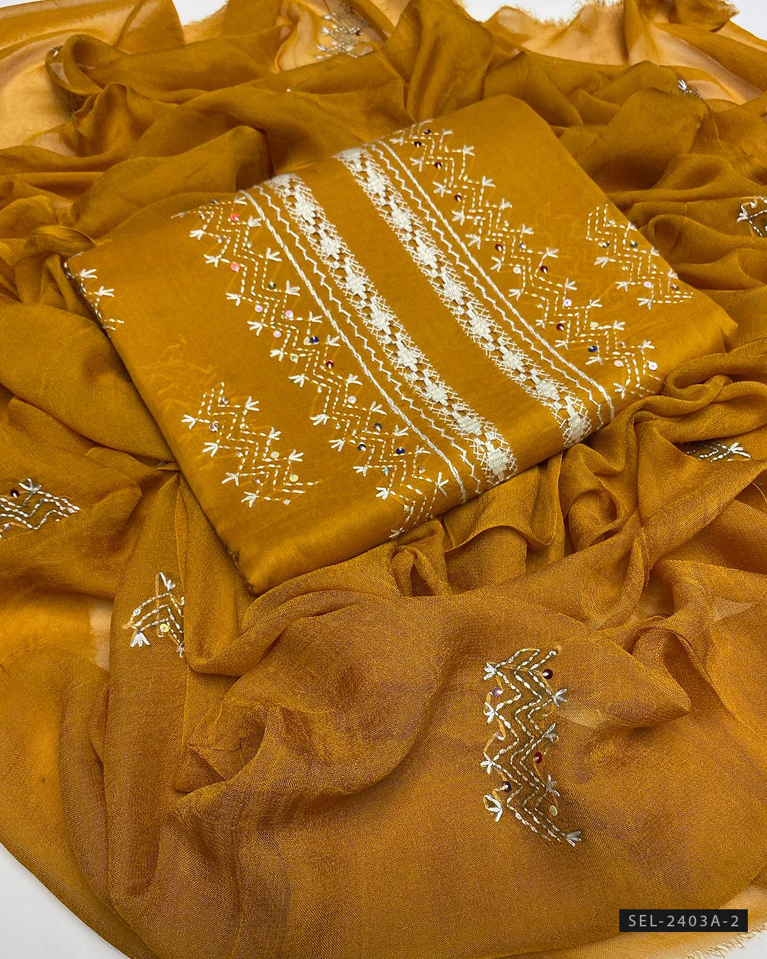 3 PC Unstitched Hand Embroidered Lawn Dress Collection